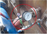 A digital pressure gauge is installed